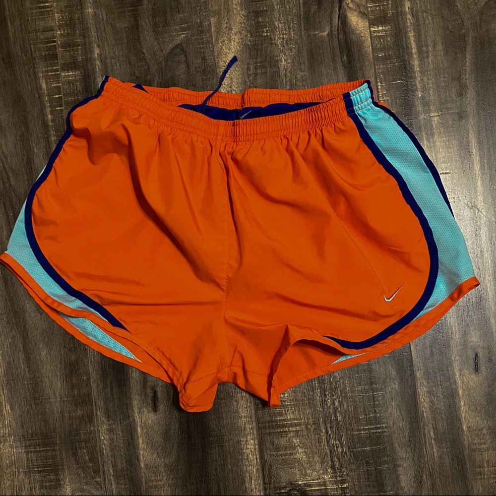 Nike Women's Orange Athletic Shorts with Light Blue Trim